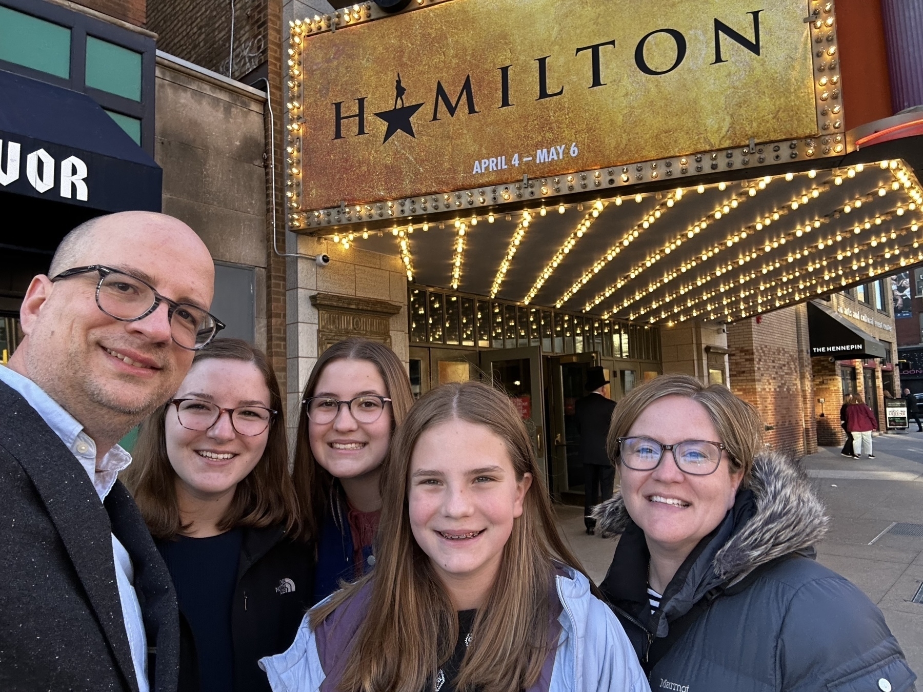 My family in front of the Hamilton marquee