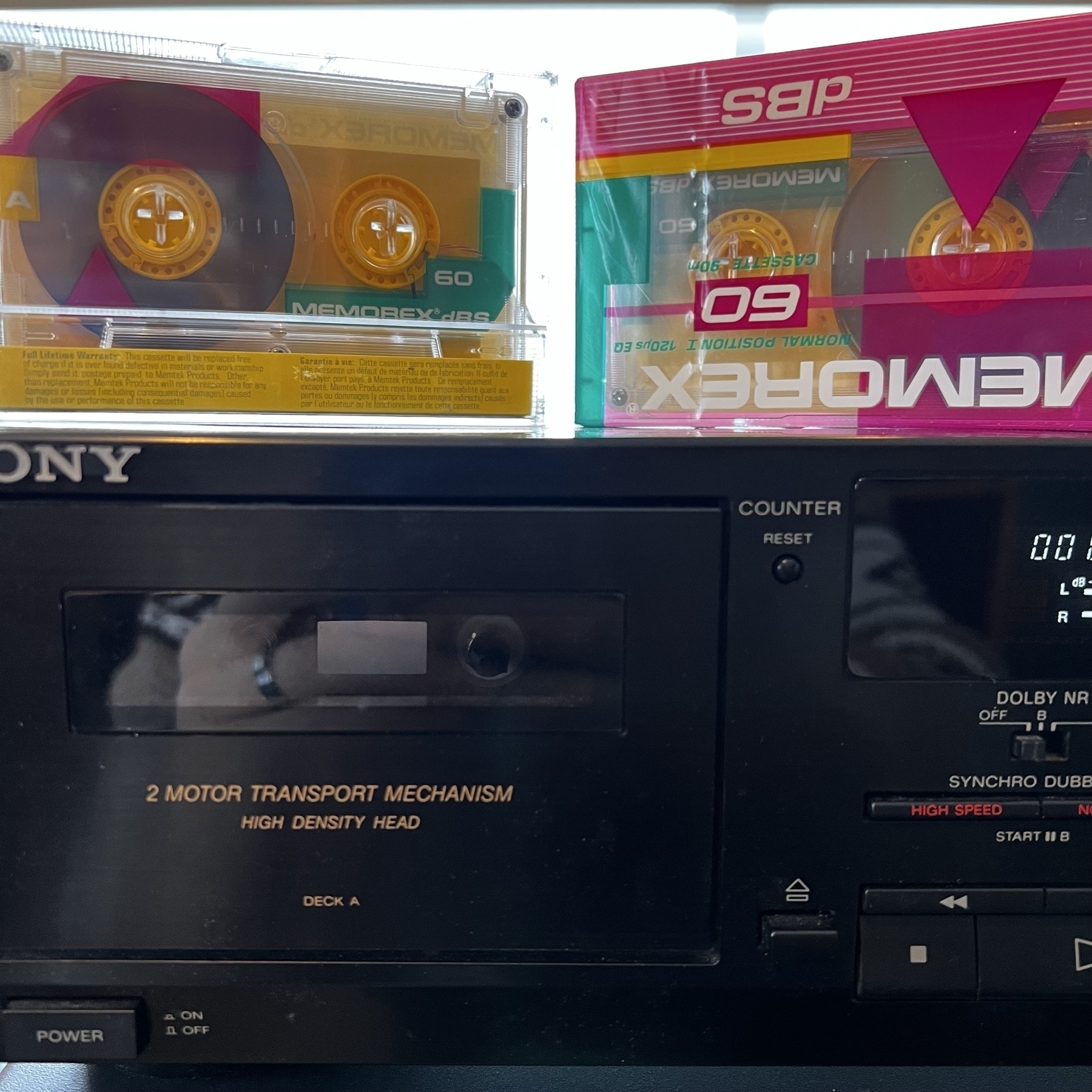 A component cassette tape deck and a blank cassette tape.